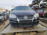 Dezmembrez VW Jetta 2.0 TDI cod BMM 140CP an 2009 volan stanga