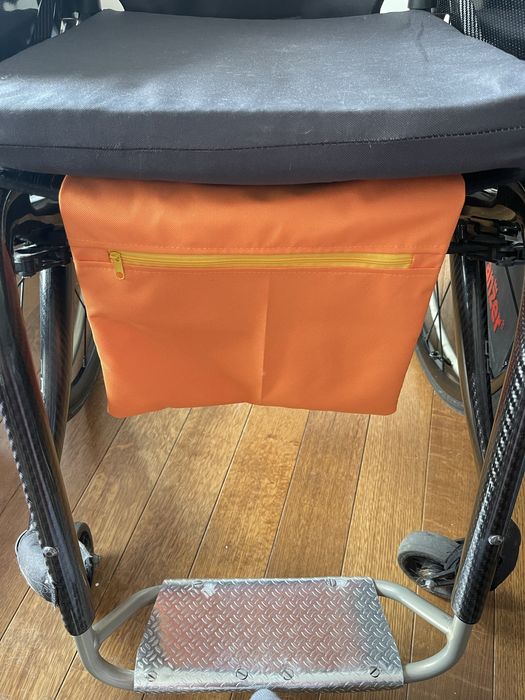 Buzunar scaun rotile