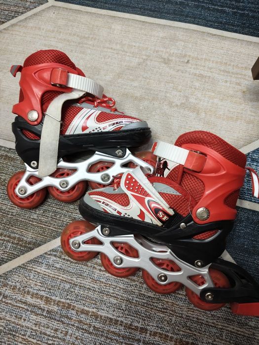 Роликовые коньки