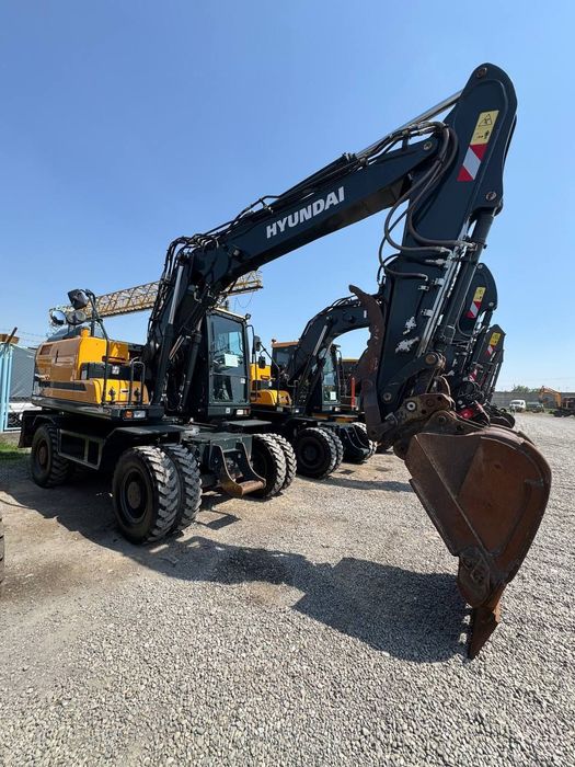 Экскаватор хизмати