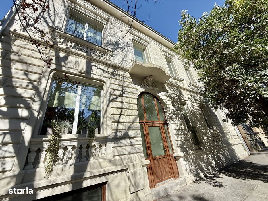 Clădire boutique de birouri ultracentrală – panouri fotovoltaice & tav