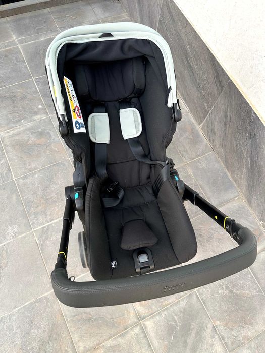 Автокресло и детская коляска Doona