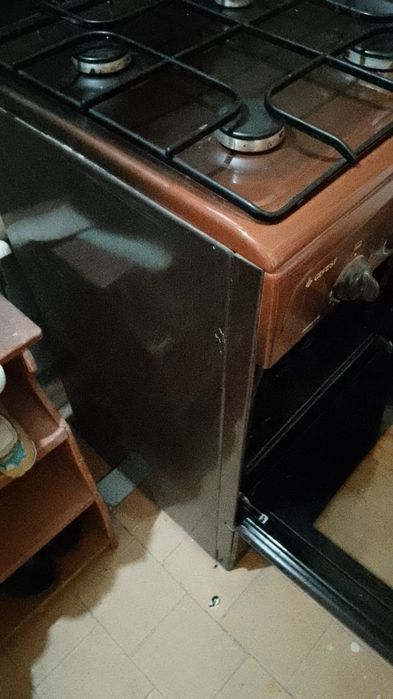Продаётся новая газ плита тёмно-коричневого цвета Гефест