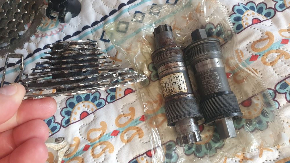 Componente bicicleta butuc pinioane pedale manete monobloc ghidon pipa