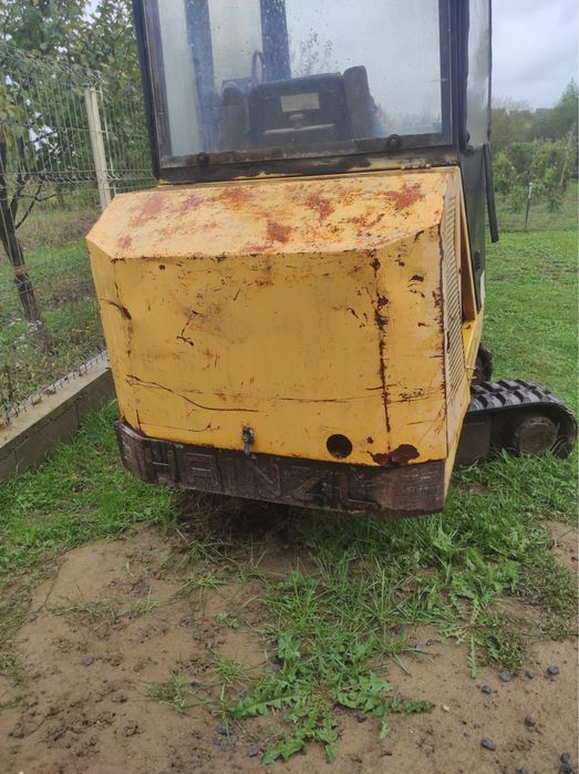 mini excavator kubota motor in trei pistoate