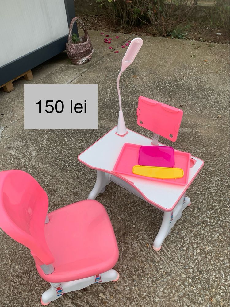 Masa de birou reglabila pe mai multe inaltimi