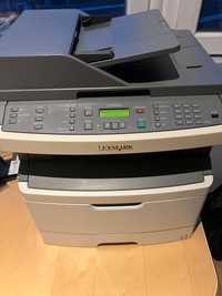 Принтер и скенер  Lexmark x364dn