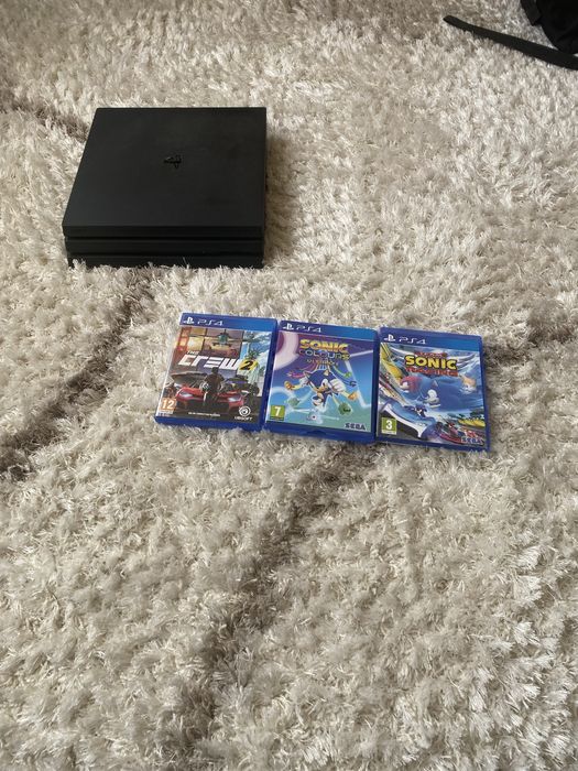 Ps 4 pro si trei jocuri si doua manete