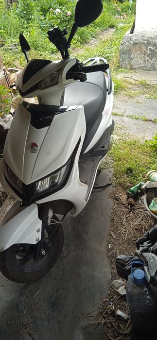 Скутер бензиновый 125к
