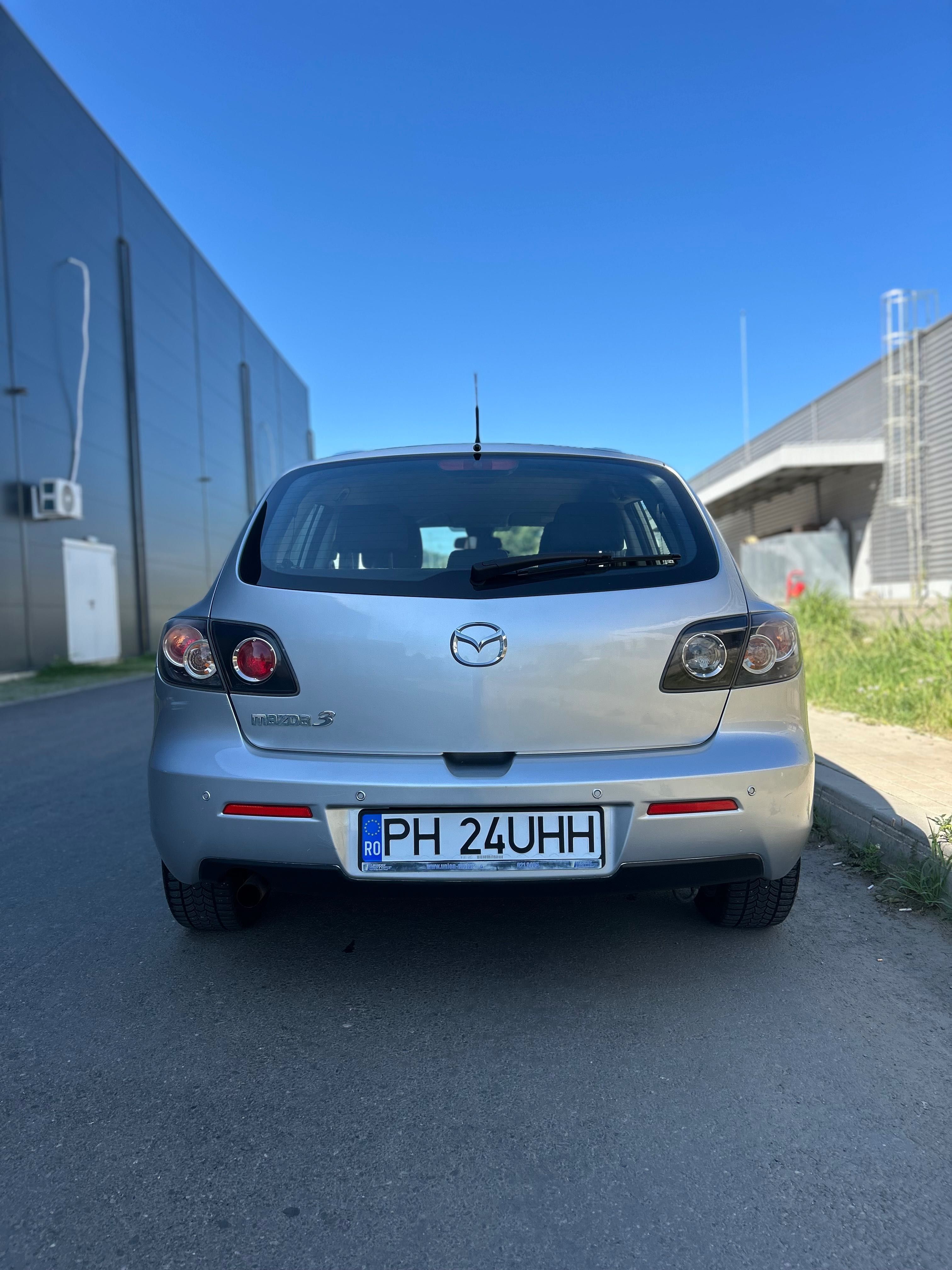 Mazda 3  1,6 benzină .