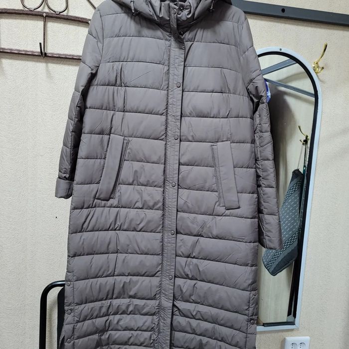 Продам стёганное пальто  новое.