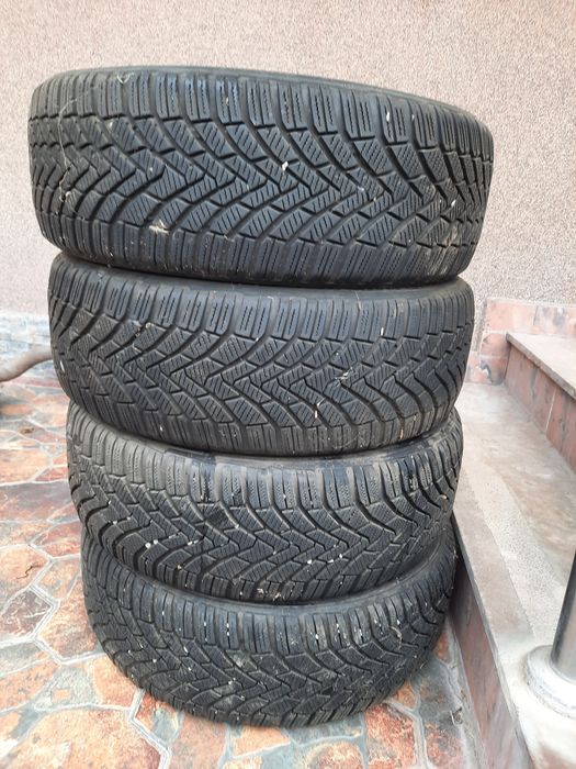 Vand anvelope iarna 205/55/16 Continental aproape noi la SUPER PRET!