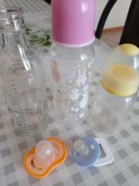 Бутылочки и пустышки для новорожденных.