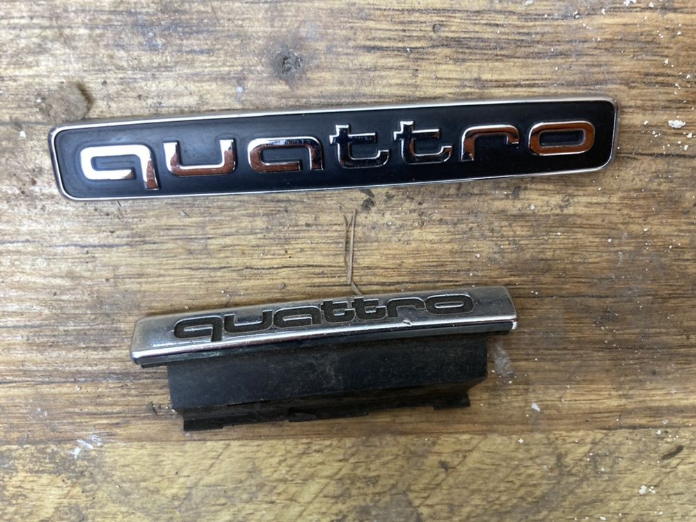 Emblema sigla audi quattro