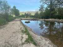 Teren la munte cu lac 6500 mp