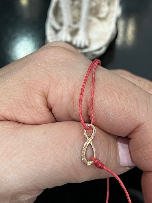 Продам оригинальный золотой комплект бесконечность