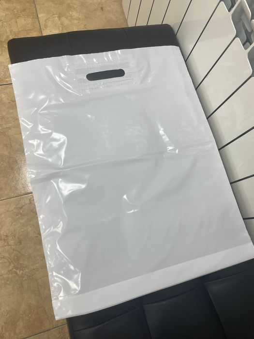 Продам белые пакеты 30х40