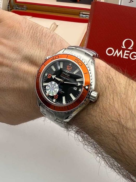 omega seamaster planetocean сребристо / оранжево