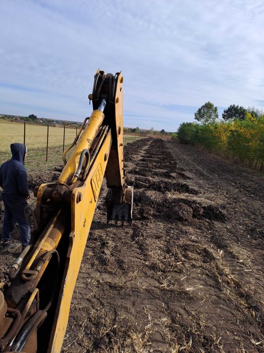 Buldoexcavator de inchiriat Basculanta 10 T  de inchiriat