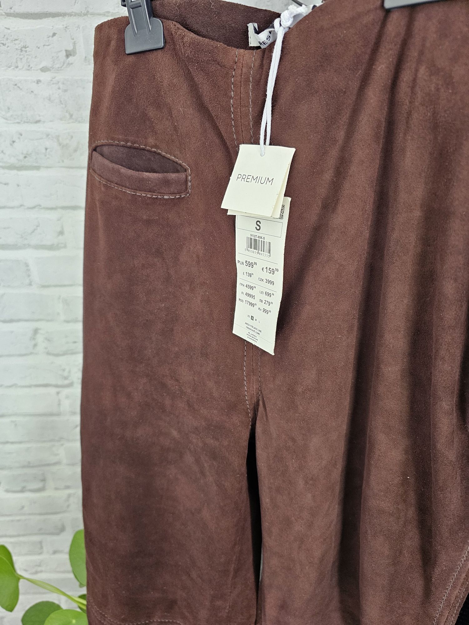 Pantaloni piele naturala intoarsa