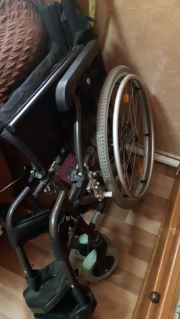 Инвалидную      коляску
