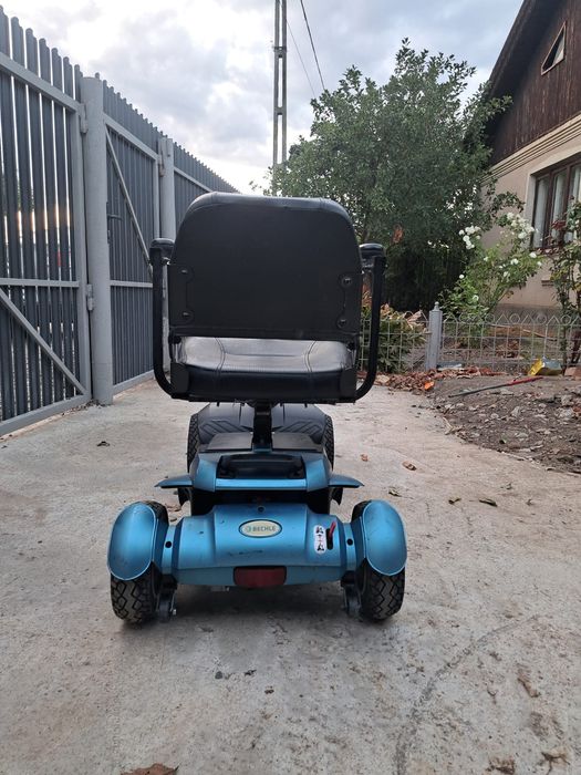 Cărucior scuter electric