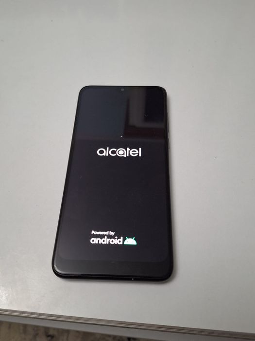 Vand telefon alcatel