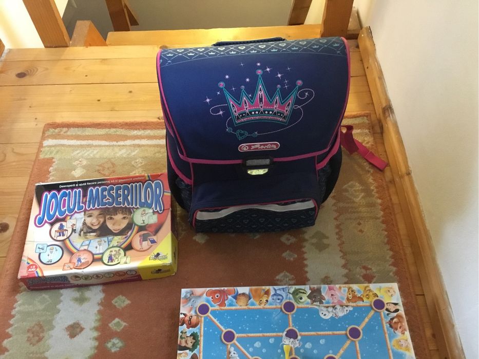 Ghiozdan Herlitz cu 2 jocuri și  lot pachetele cu jucării