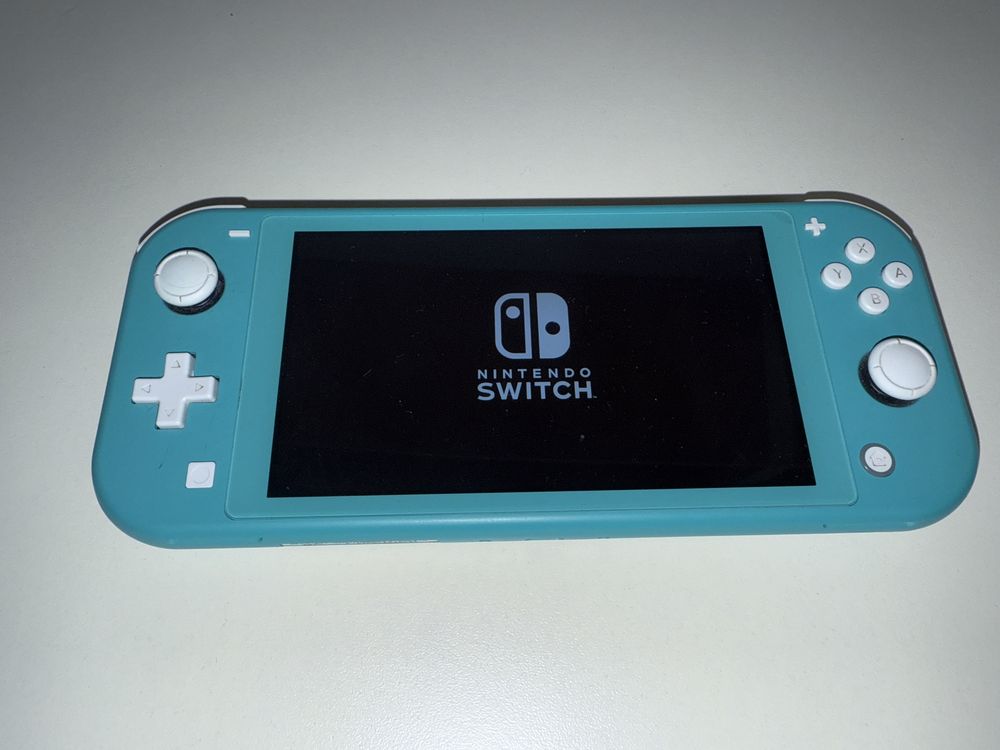 Nintendo Switch lite, turcoaz, functioneaza impecabil + husa + folie