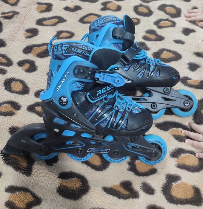 Роликовые коньки