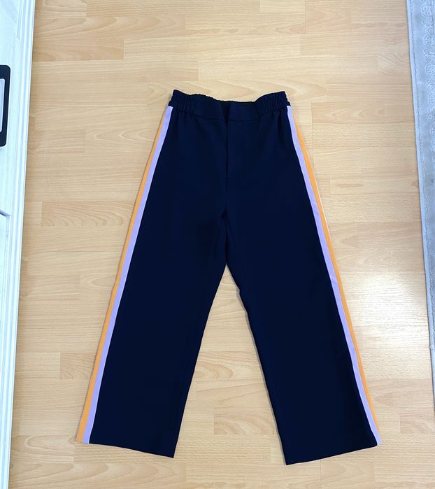 Pantaloni evazati 3/4 Zara