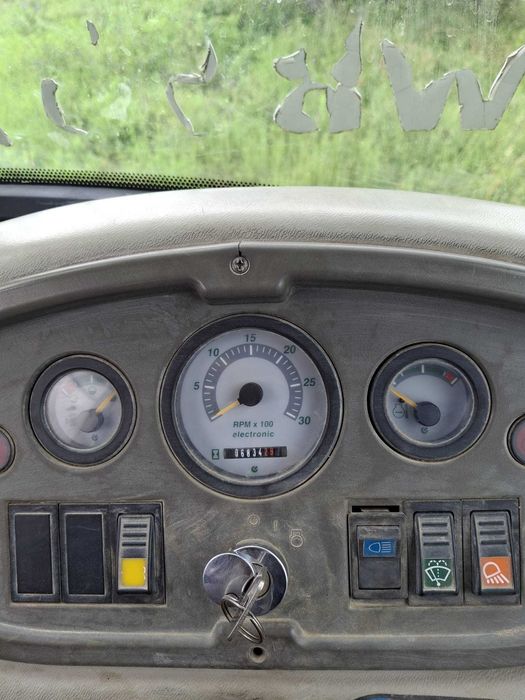 Buldoexcavator Komatsu