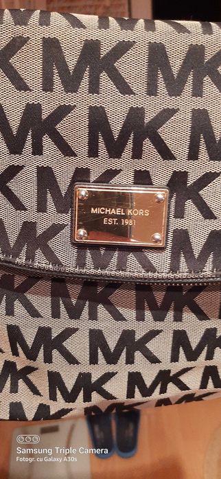 Geanta dama MICHAEL KORS...purtata odata 250..neg