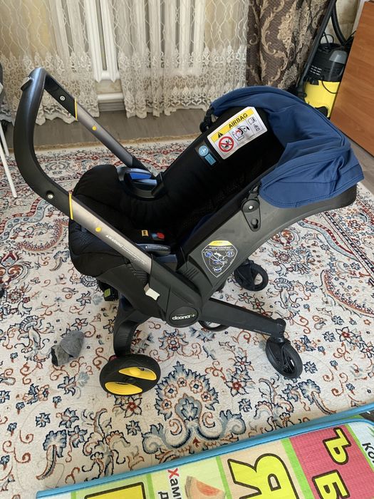 Продам  Коляска-автокресло Doona Royal,
