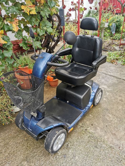 Scuter electric pentru persoane cu probleme de mobilitate