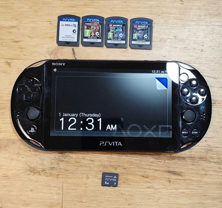 PS Vita Slim 2003 + 4 cartușe și tuburi