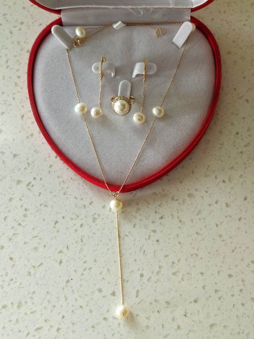 Продам новый  золотой  набор 585пр с жемчужными вставками.