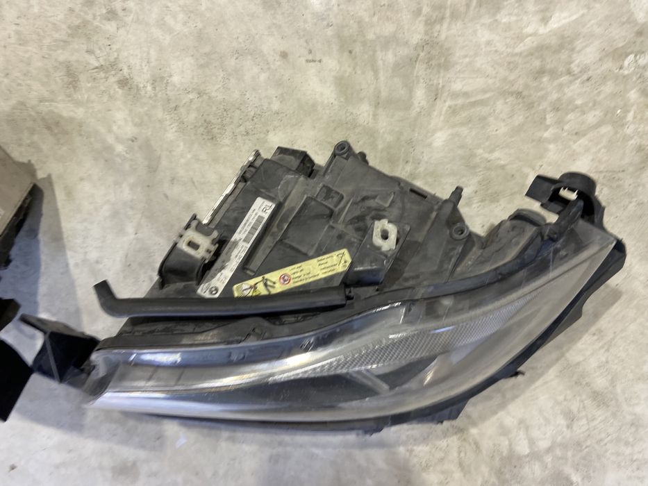 Far faruri stanga dreapta xenon Bmw E90 E91 Nfl de ANGLIA