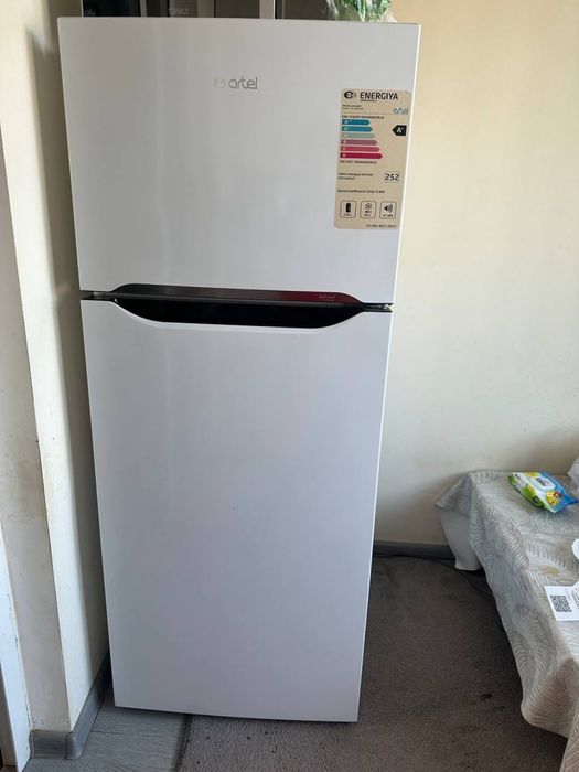 Холодильник Артел.