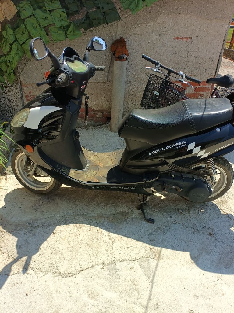 Скутер 125кубика