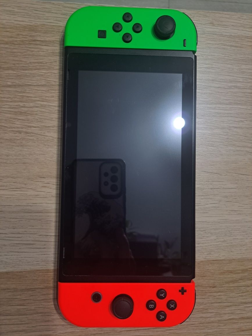 Nintendo Switch (puțin folosit)