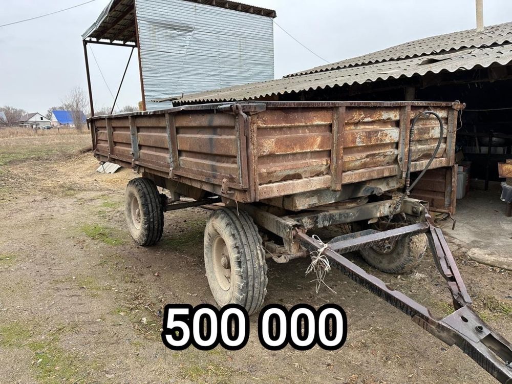 Трактор с огригатами.