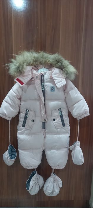 Продам детский комбинезон новый