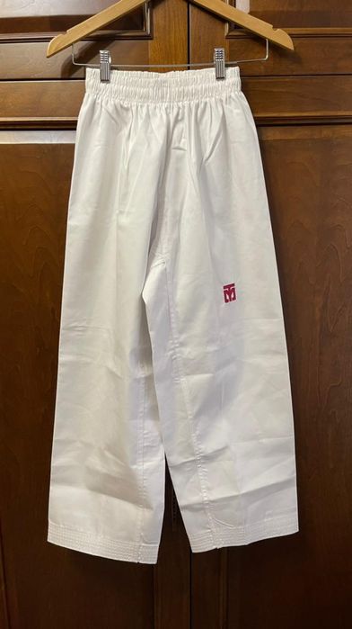 Продам штаны (добок). Mooto. Новые.  Размер 150 см