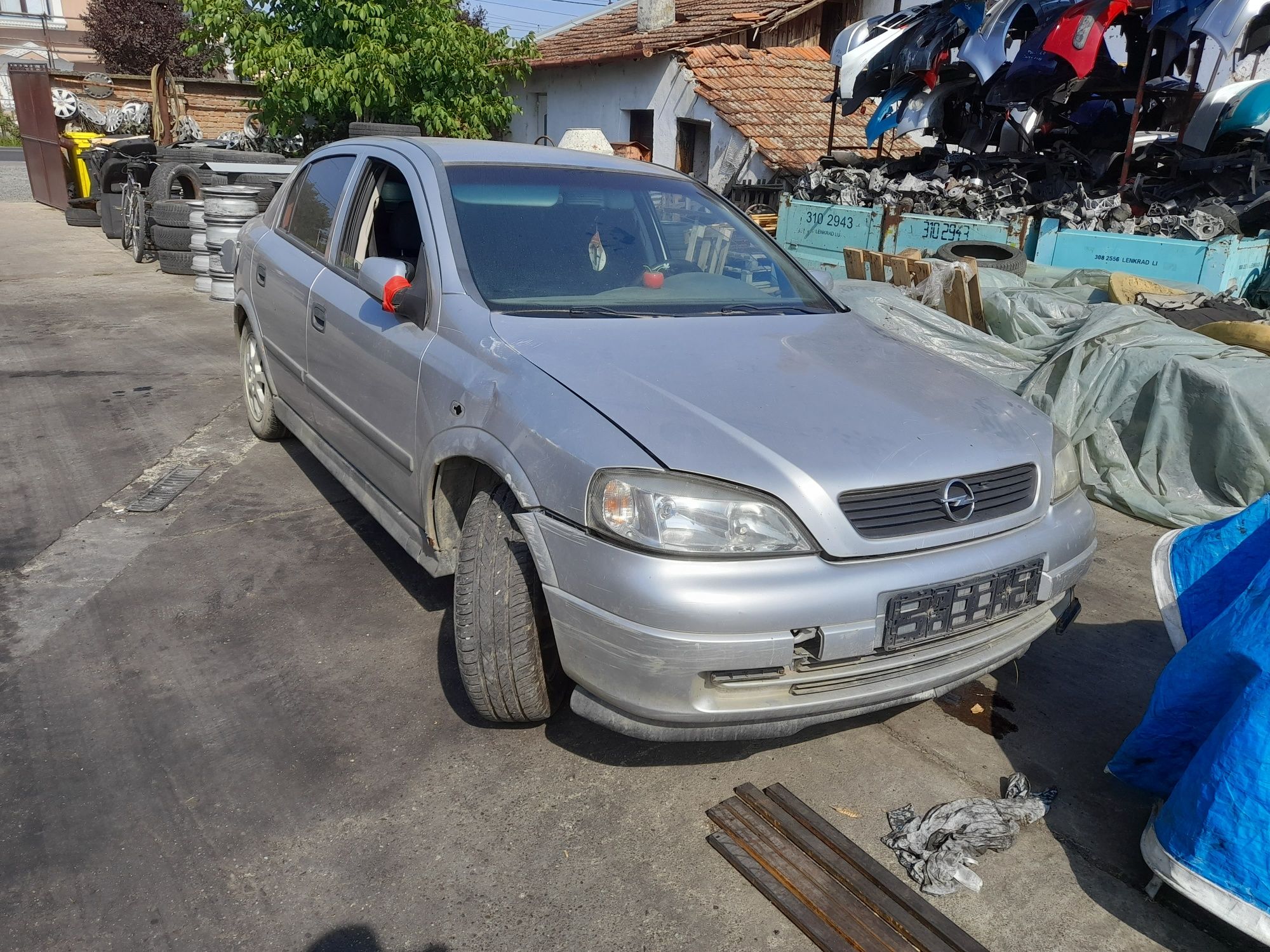 Far/faruri stanga/dreapta Opel Astra G