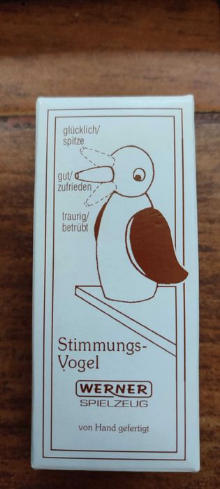 Statuie de lemn pasăre