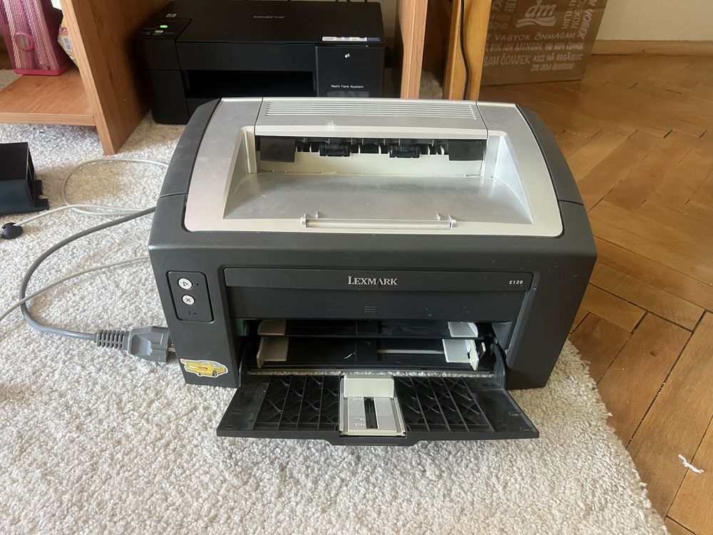 Принтер Lexmark e120 черно бял