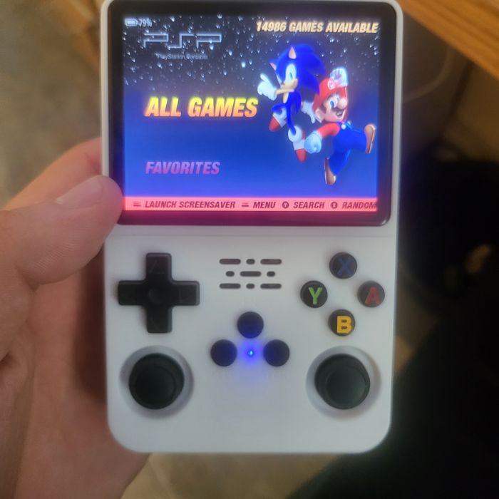 Игровой консоль R36s с 15000 игр