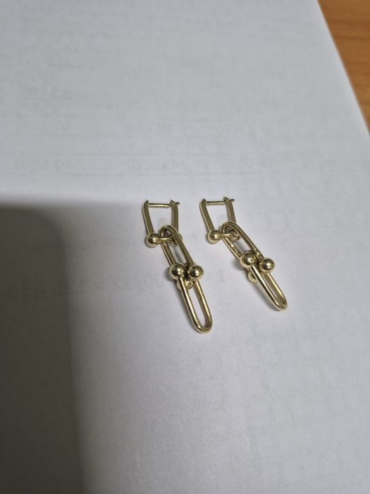 Продам золотые серьги