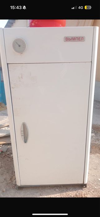 Напольный отопительный котёл. Жылытатын котёл жерге қойылады